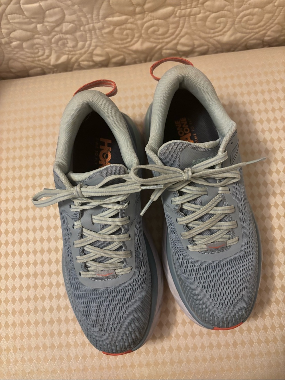 Light blue women’s Roku athletic shoes. Cushioned interior. Coral trim. - Picture 1 of 7